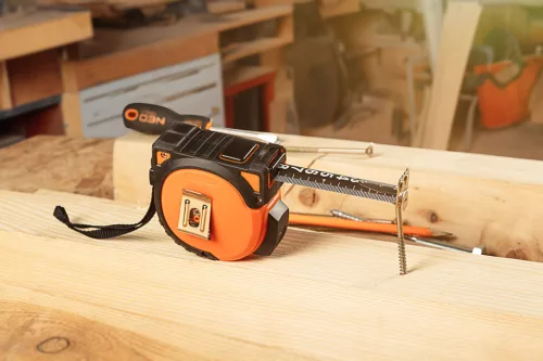 Mérőszalag 5m / 19mm, erősített rugó, acél, fekete szalag fehér nagyított skála, mágnes, autostop+rögzítő